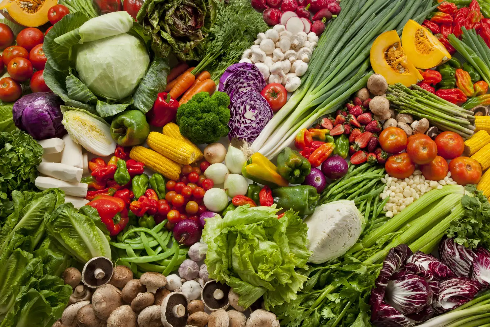 Chef preparing fresh produce in a South Florida restaurant kitchen